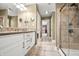 This is a full bathroom with a shower and toilet that is separate from the vanity and sink at 7833 Meadow Bend Dr, Indianapolis, IN 46259