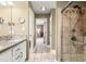 This is a full bathroom with a shower and toilet that is separate from the vanity and sink at 7833 Meadow Bend Dr, Indianapolis, IN 46259