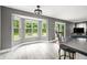 Inviting breakfast nook with bay windows and views of the backyard at 7833 Meadow Bend Dr, Indianapolis, IN 46259