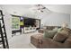 Spacious living room features high ceilings, modern fan, and comfortable seating with decorations at 7833 Meadow Bend Dr, Indianapolis, IN 46259