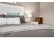 This stylishly decorated primary suite boasts natural light and is the perfect oasis at 7833 Meadow Bend Dr, Indianapolis, IN 46259