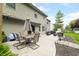 Backyard patio with dining table and seating area for outdoor enjoyment at 7833 Meadow Bend Dr, Indianapolis, IN 46259