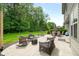 Spacious patio with outdoor seating and fire pit for entertaining at 7833 Meadow Bend Dr, Indianapolis, IN 46259