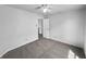 This is a light and airy bedroom with plush carpeting and a ceiling fan at 7854 Wolfgang Pl, Indianapolis, IN 46239