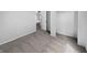 Neutral-toned bedroom with carpeted floors, a closet and adjoining room at 7854 Wolfgang Pl, Indianapolis, IN 46239