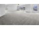 Large bedroom with carpet, many windows and ample natural light at 7854 Wolfgang Pl, Indianapolis, IN 46239