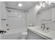 Bathroom featuring a shower and bathtub combo, a round mirror, and a modern vanity at 8176 Shorewalk Dr # C, Indianapolis, IN 46236