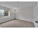 Bright bedroom with large window and neutral carpeting. A simple yet inviting space at 8176 Shorewalk Dr # C, Indianapolis, IN 46236