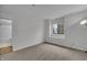Inviting bedroom with large window and doorway to bathroom at 8176 Shorewalk Dr # C, Indianapolis, IN 46236