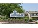 View of the ShoreWalk community sign with beautiful landscaping at 8176 Shorewalk Dr # C, Indianapolis, IN 46236