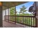 Outdoor deck with view of trees and blue sky at 8176 Shorewalk Dr # C, Indianapolis, IN 46236