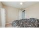 Cozy bedroom featuring a bed with floral bedding, a ceiling fan, and lots of light at 985 Farmington Trl, Brownsburg, IN 46112