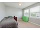 Light-filled bedroom with carpet flooring, and two dressers for storage and personal touch at 985 Farmington Trl, Brownsburg, IN 46112