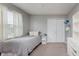 Bedroom featuring a bed, curtains, a closet and desk at 985 Farmington Trl, Brownsburg, IN 46112
