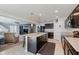 Lovely kitchen with stainless appliances, large center island, and dark brown cabinets at 985 Farmington Trl, Brownsburg, IN 46112