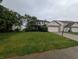 Charming two-story home featuring a lush green lawn and attached two car garage at 10150 Beresford Ct, Fishers, IN 46038