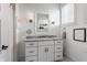 Bathroom with white vanity, granite countertop, and tiled floors at 10974 Harbor Bay Dr, Fishers, IN 46040