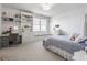 Bright bedroom with built-in desk, window seat, and ample natural light at 10974 Harbor Bay Dr, Fishers, IN 46040