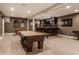 A recreational game room features a pool table, bar area, and comfortable seating at 10974 Harbor Bay Dr, Fishers, IN 46040