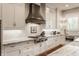 Stylish kitchen with custom cabinetry, stainless steel appliances and brick backsplash at 10974 Harbor Bay Dr, Fishers, IN 46040