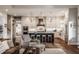 Gourmet kitchen with stainless steel appliances, center island, and breakfast bar seating at 10974 Harbor Bay Dr, Fishers, IN 46040