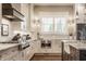 Well-appointed kitchen with stainless appliances and granite countertops at 10974 Harbor Bay Dr, Fishers, IN 46040