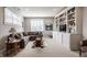 Bright living room with built-in shelving, sectional sofa, and cozy decor at 10974 Harbor Bay Dr, Fishers, IN 46040