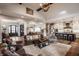 Open-concept living space features wood floors, shiplap ceiling, and a gourmet kitchen at 10974 Harbor Bay Dr, Fishers, IN 46040