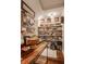 Walk-in pantry with custom shelving, wooden countertops, and decor to personalize the space at 10974 Harbor Bay Dr, Fishers, IN 46040