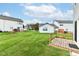 A spacious backyard with well maintained lawn and multiple wooden decks at 1124 Paradise Ct # B, Greenwood, IN 46143
