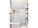 Bathroom featuring a tiled shower and floral shower curtain at 1124 Paradise Ct # B, Greenwood, IN 46143