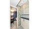 Unique bathroom design featuring patterned floor tiles, a pedestal sink and adjacent storage at 1124 Paradise Ct # B, Greenwood, IN 46143