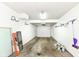 Spacious garage with white walls, and a sealed concrete floor at 1124 Paradise Ct # B, Greenwood, IN 46143