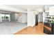 Open floorplan featuring a cozy living room and a staircase, blending with a modern kitchen space at 1124 Paradise Ct # B, Greenwood, IN 46143
