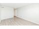 Bright living room featuring wood-look floors and neutral paint at 1124 Paradise Ct # B, Greenwood, IN 46143