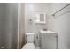 Cozy bathroom featuring modern vanity and fixtures, with a shower and tub combo at 1141 Madeira St, Indianapolis, IN 46203