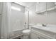 Bright bathroom featuring a shower and tub, a modern vanity, and minimalist design at 1141 Madeira St, Indianapolis, IN 46203