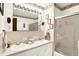 Bathroom featuring dual sinks and a shower bath combination for relaxation and convenience at 11630 Deanna Dr, Indianapolis, IN 46229