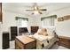 Cozy bedroom with a ceiling fan, dresser, and trunk at the end of the bed, creating a relaxing retreat at 11630 Deanna Dr, Indianapolis, IN 46229