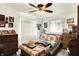 Comfortable bedroom with dual windows, ceiling fan, and traditional décor with ample storage at 11630 Deanna Dr, Indianapolis, IN 46229