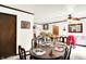 Inviting dining room provides ample seating around a dark wood table with detailed place settings at 11630 Deanna Dr, Indianapolis, IN 46229