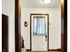 Welcoming foyer with white door and decorative curtain and vintage decor at 11630 Deanna Dr, Indianapolis, IN 46229