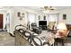 Bright and airy living room with a ceiling fan, comfortable seating, and a relaxed atmosphere at 11630 Deanna Dr, Indianapolis, IN 46229
