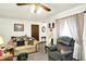 Inviting living room featuring classic furniture and lots of natural light at 11630 Deanna Dr, Indianapolis, IN 46229