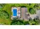 An aerial view of a home with an in-ground pool and meticulous landscaping at 12043 Searay Dr, Indianapolis, IN 46236