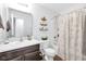Bathroom featuring sink and vanity with storage and shower with tub at 12105 Fall Ct, Indianapolis, IN 46229