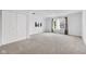 Spacious bedroom featuring neutral walls, plush carpeting, and a large closet for storage at 12105 Fall Ct, Indianapolis, IN 46229