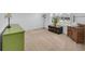 Bright bedroom with neutral carpet, natural light, and stylish furniture at 12105 Fall Ct, Indianapolis, IN 46229