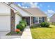 Inviting home exterior with a manicured walkway leading to a welcoming front door at 12105 Fall Ct, Indianapolis, IN 46229
