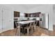 Contemporary kitchen featuring a center island with seating, stainless steel appliances, and ample counter space at 12105 Fall Ct, Indianapolis, IN 46229